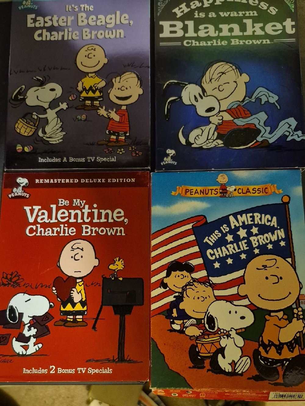 Peanuts DVD Set - Red, Blue, Purple, Orange Covers Charlie Brown Snoopy